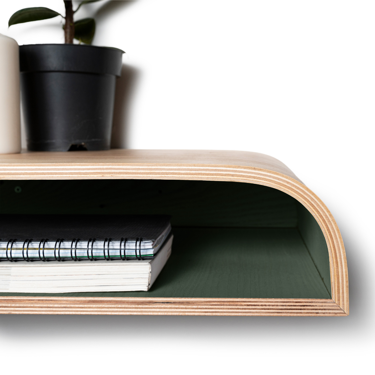 Floating nightstand with green interior and hidden mounting system