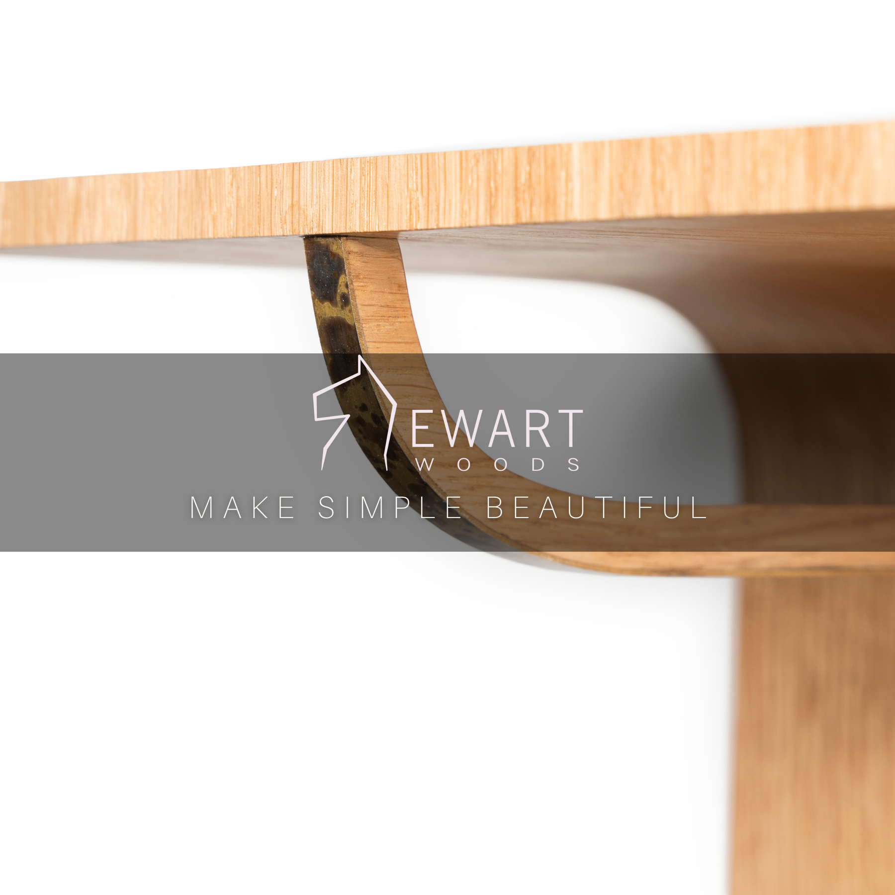 Close-up of wood wall mounted hanger rack with brass accent by manufactured EWART WOODS