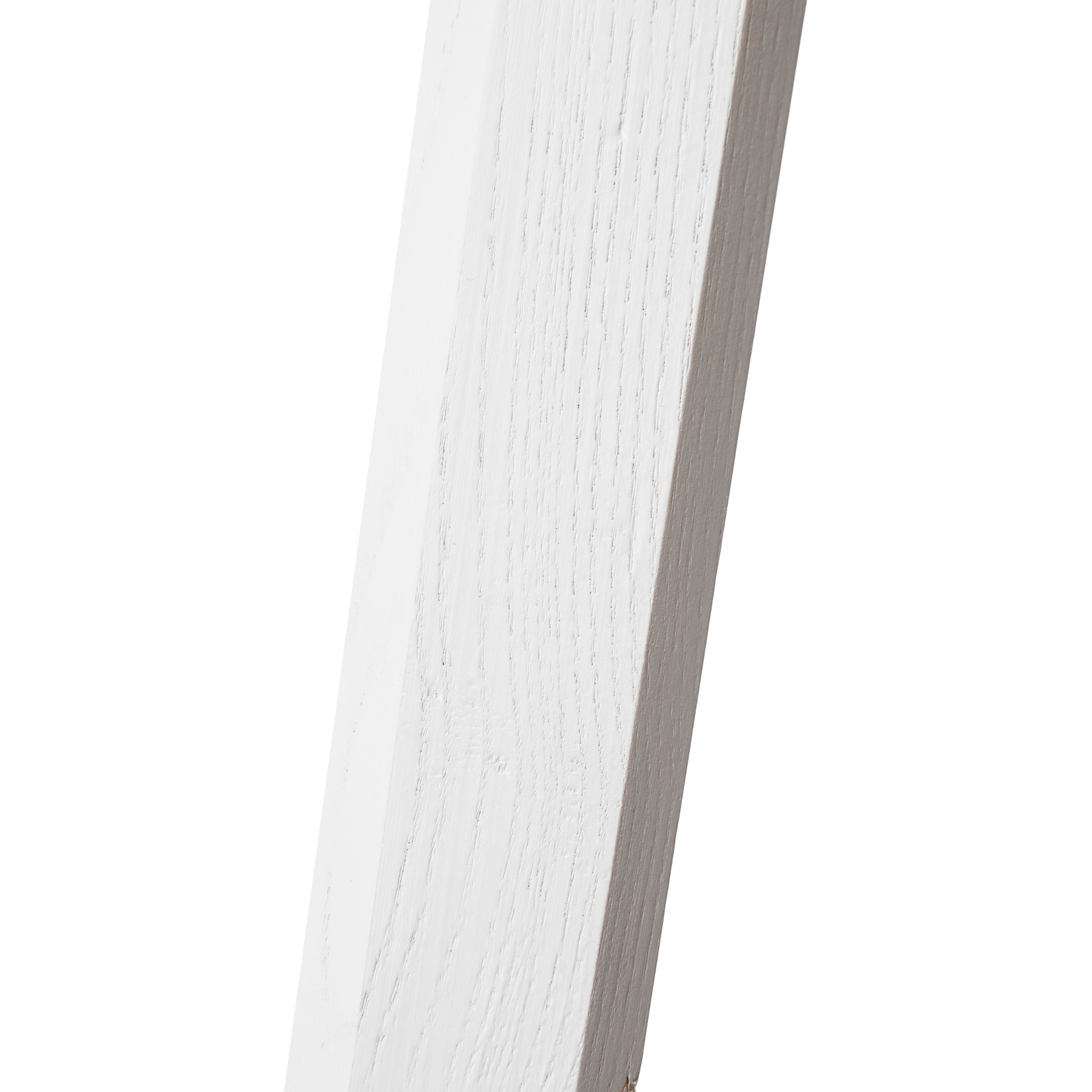 Close-up of white wooden legs from wooden rectangular nightstand