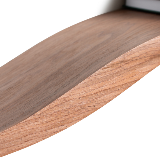 Close-up view of wood curved floating shelf solid middle wave section