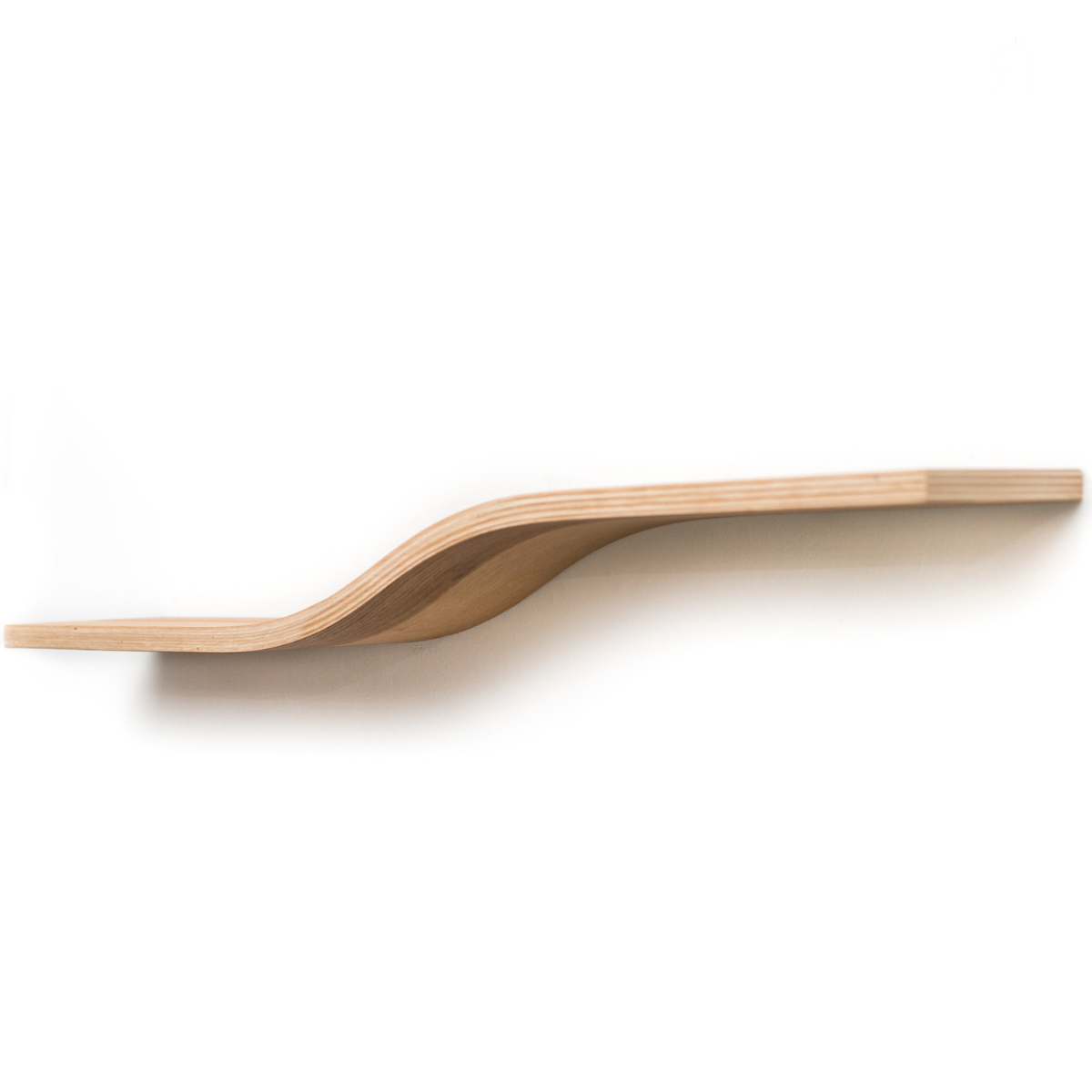 Clear view of simple floating shelf in ash wood finish