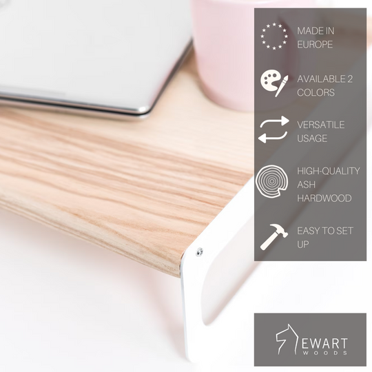 Wooden serving tray with a light ash finish and sleek white metal legs. The tray is shown with a laptop and features overlayed text highlighting key features: Made in Europe, available in 2 colors, versatile usage, high-quality ash hardwood, and easy to set up, with the &