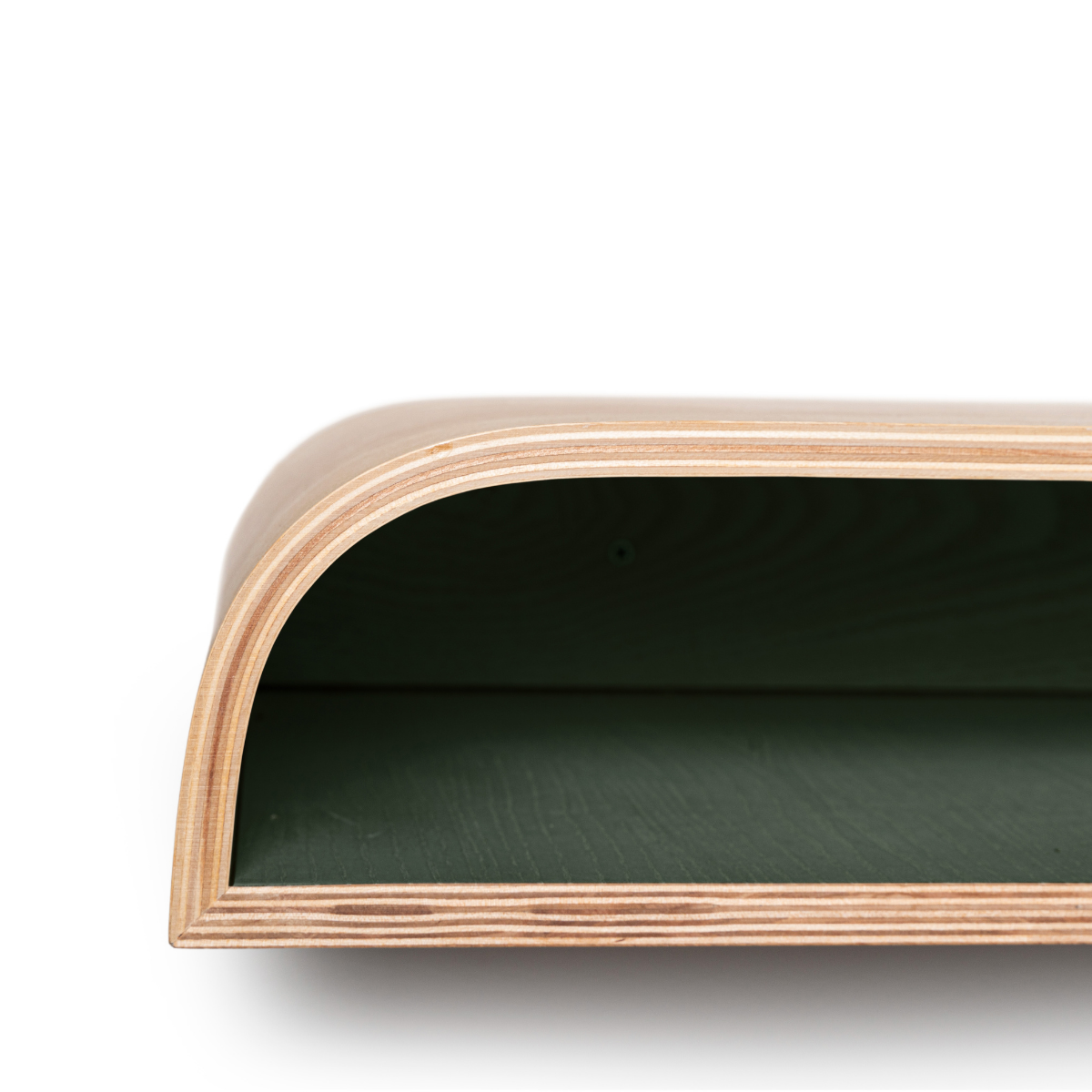 Floating nightstand green interior curved edge design close-up