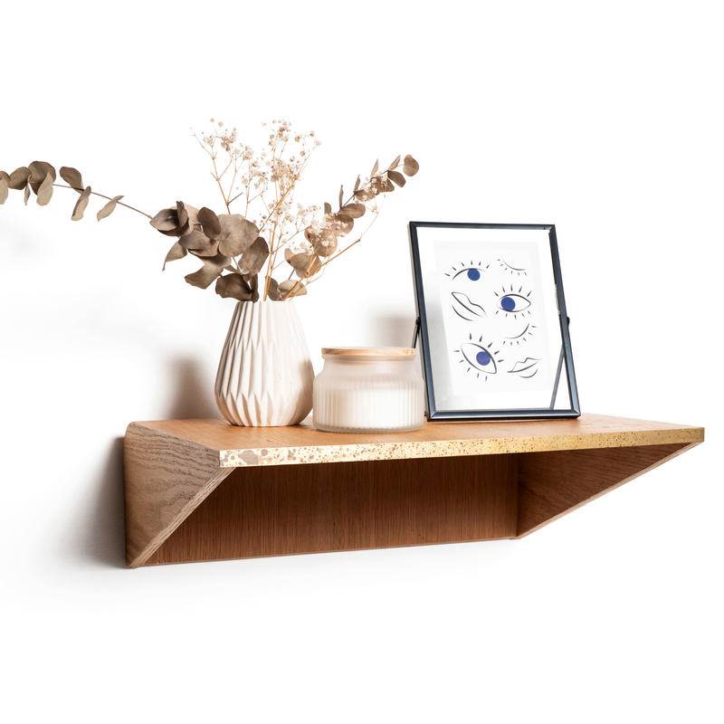 Wooden floating nightstand with brass detail and modern design