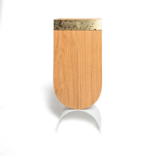 Front view of wooden standing umbrella holder with brass edge design and white curved metal leg