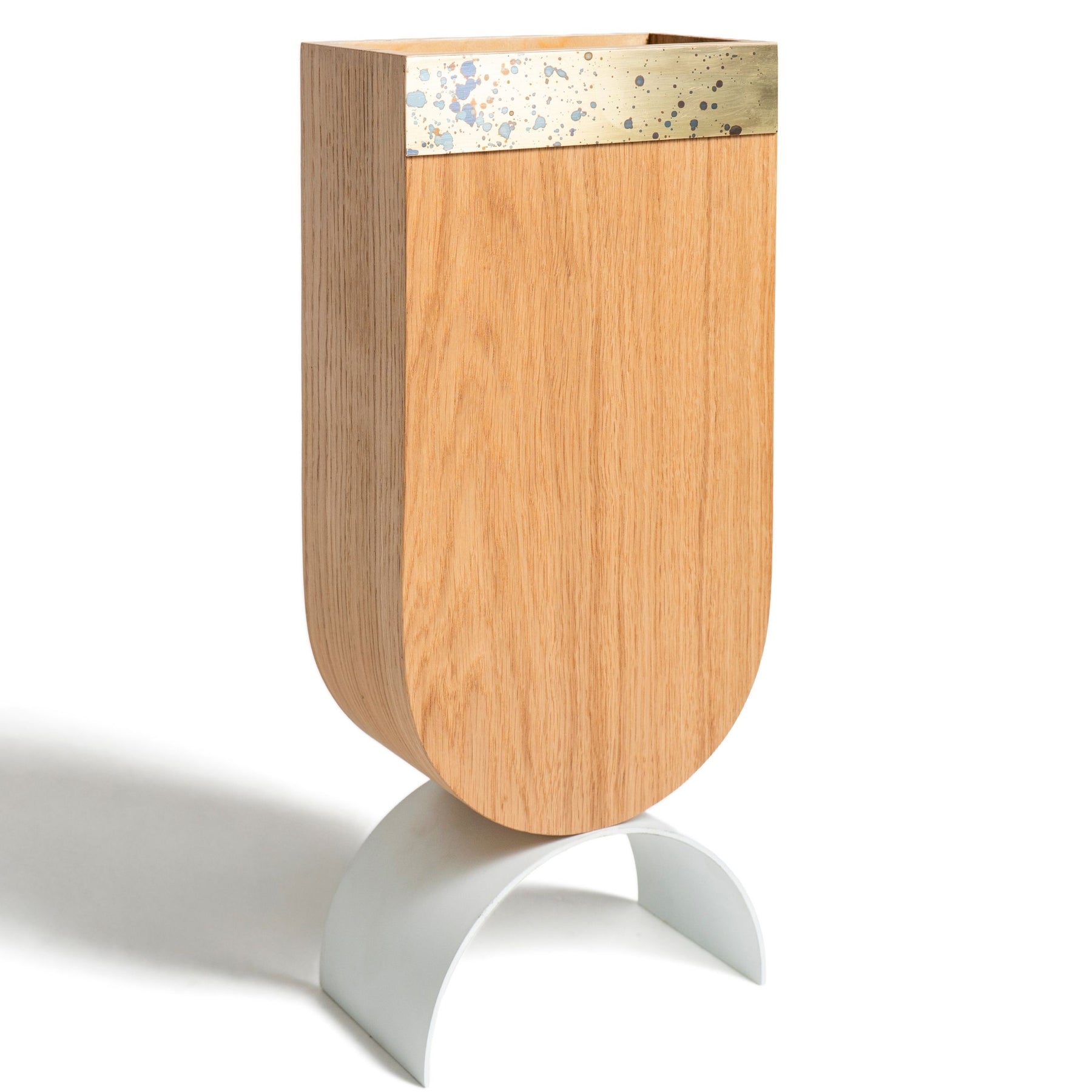 Clear view of wooden standing umbrella holder with brass edge design and white curved metal leg 
