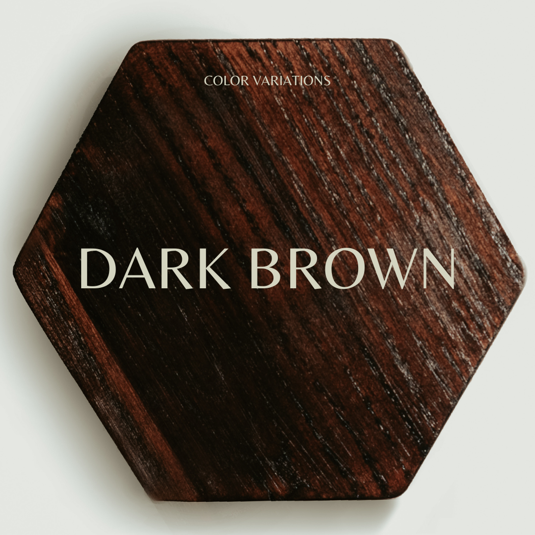 Hexagonal wooden key holder with a natural wood grain pattern, labeled &