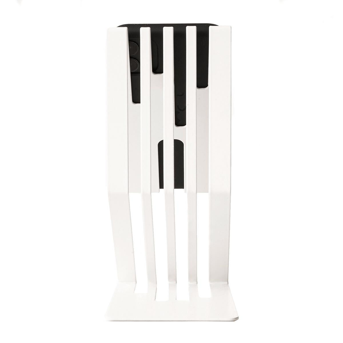 Back view of a white metal phone stand with a ribbed design, holding a smartphone vertically