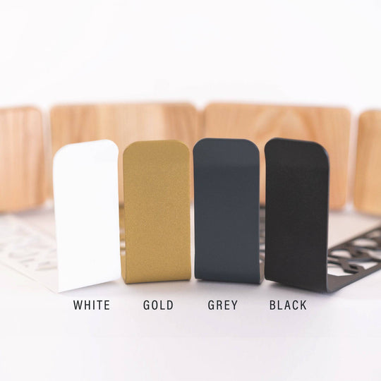 Color options for the steel frame include white, gold, grey, and black finishes, providing a sleek and modern look for any decor.